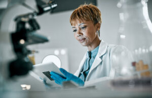 Woman looking at medical device