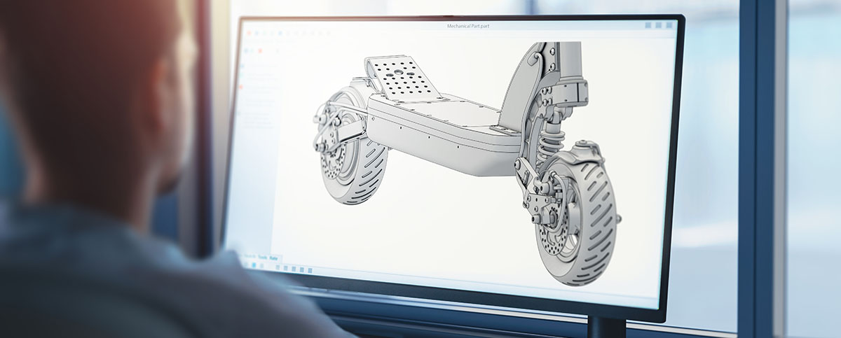 Image-An engineer works on an electric scooter 3D model  created using CAD