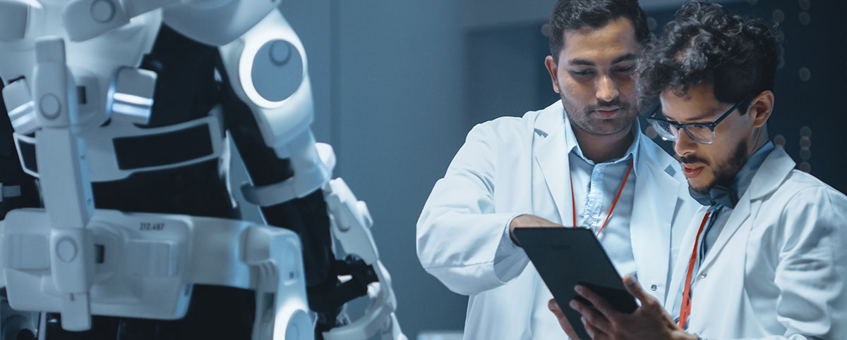 Image-Engineers and Scientists Work on Robotics Exoskeleton Prototype