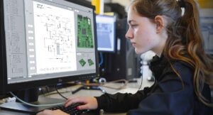 Image-Engineer looking at electronic component drawing