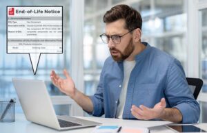 Image-Man surprised looking at EOL notification on laptop