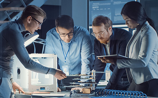 Image-Engineers collaborating with 3D Printer and PCB Motherboards, Advanced Technology