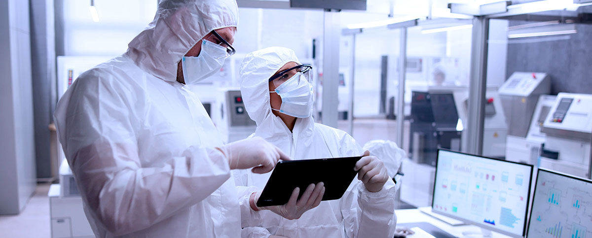 Image-Engineers using a tablet making an inspection in a Factory Clean Room