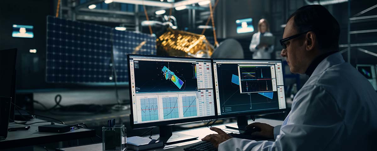 Image-Engineer Uses Computer while Working on Satellite Construction.