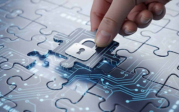 Image-Hand placing a cybersecurity padlock puzzle piece onto a glowing circuit board, symbolizing digital data protection
