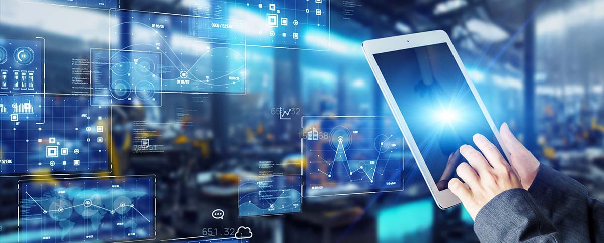 Image-Engineer in factory using tablet with overlays of integrated software