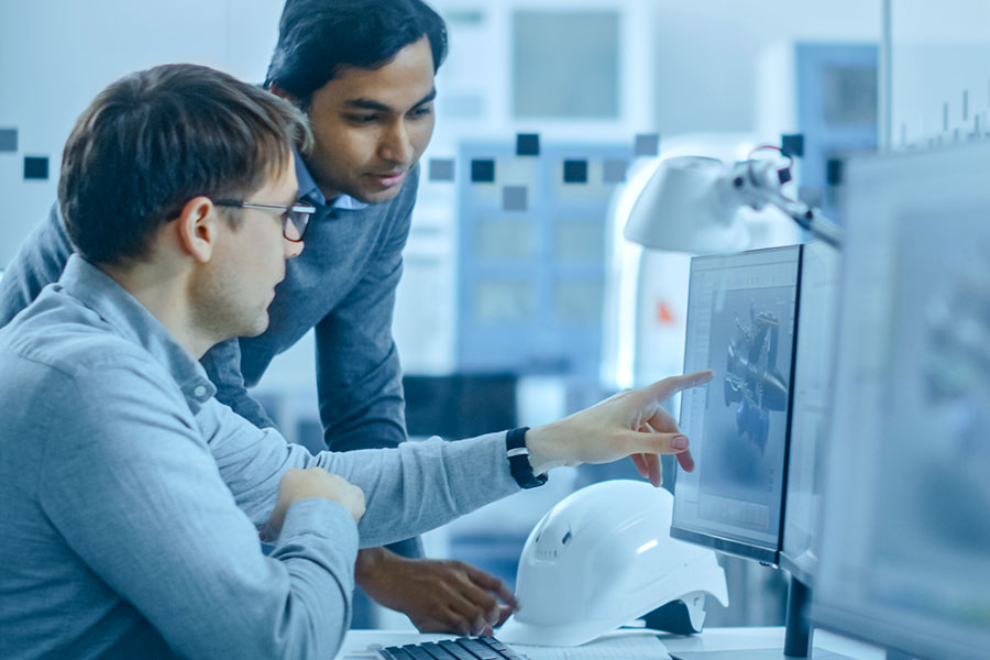 Image-Engineers designing 3D Component using CAD software In R&D setting