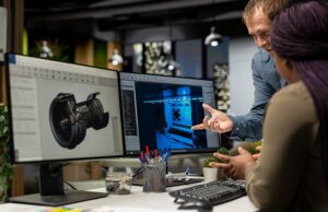 Image-Product engineers looking at CAD drawing
