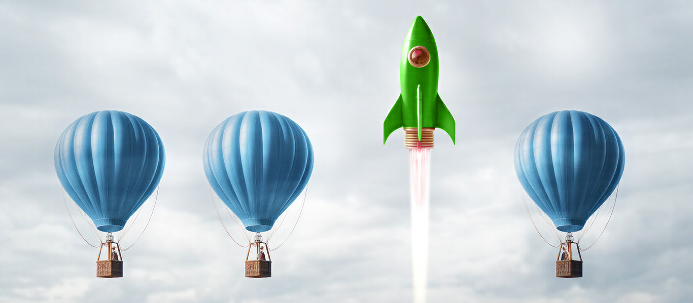 Image-Hot air balloons racing to the top but an individual leader winning the competition using a rocket.