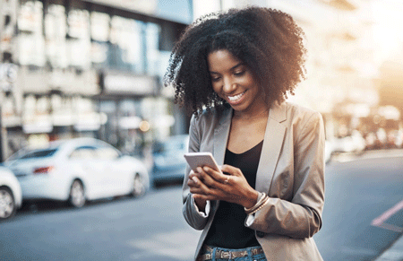 Woman Reviewing PLM on her Smartphone